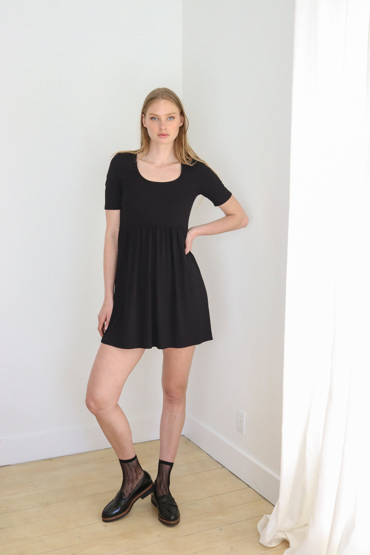 Made in Canada. Women's Clothing. Bamboo fabric. OEKO-TEX certified. Women's dress. Super soft fabric. Bamboo rib knit fabric. Empire waist. Flared skirt. Little black dress.